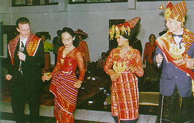 After the dowry is paid, the bride and groom are dance the landek for their guests in the middle of the reception hall